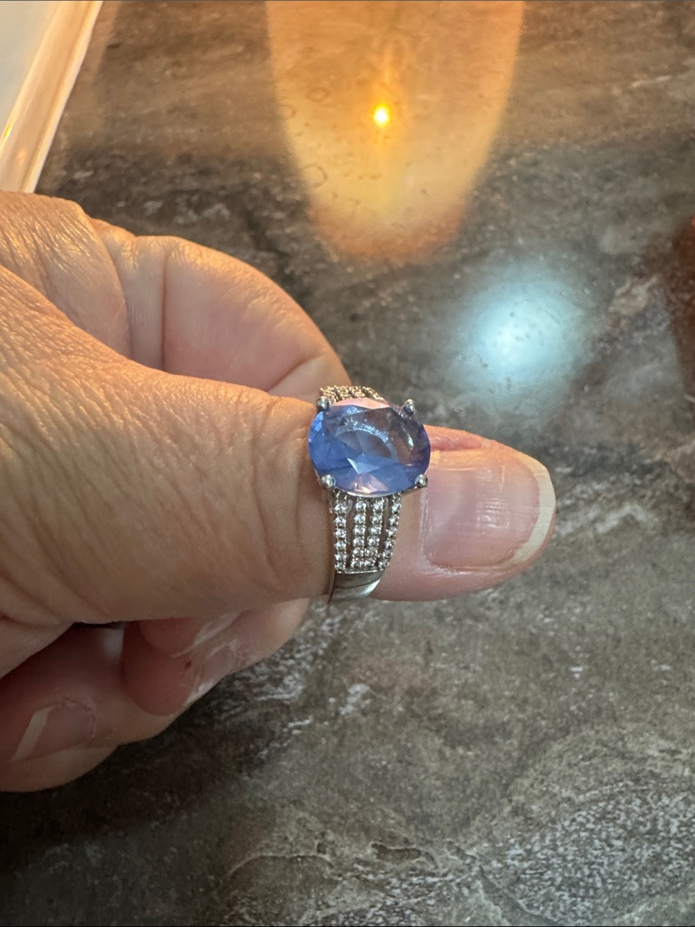 Silver Ring with Oval Blue Gemstone and Pavé Accents